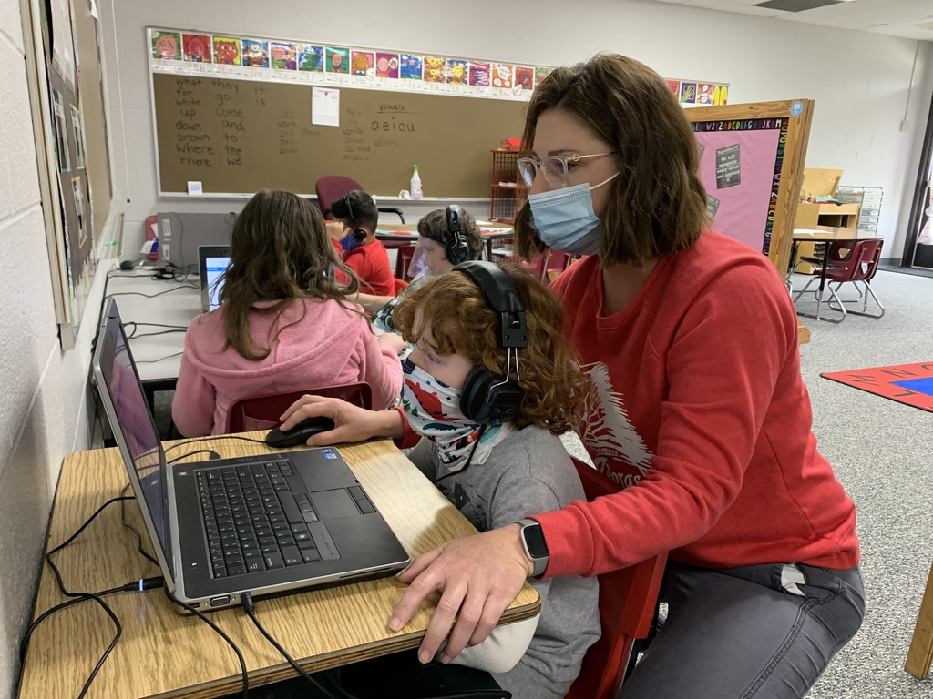 Mrs. Freeman works on literacy with 1st grade students. #CPSZEBRAPRIDE