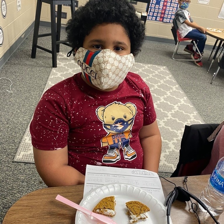 1st grade students in Mrs. Halbrook's class worked on halves, fourths, quarters with oatmeal cookies.