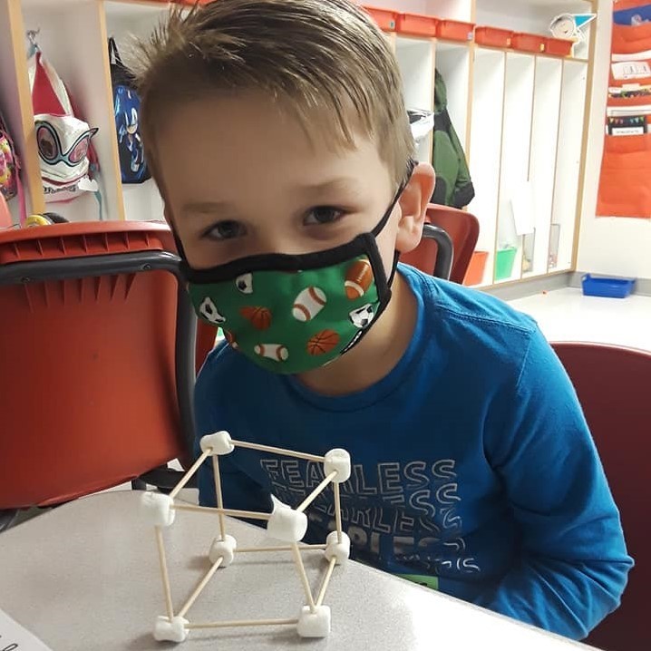 Today we took our knowledge about 3D shapes and built cubes out of toothpicks and marshmallows!
