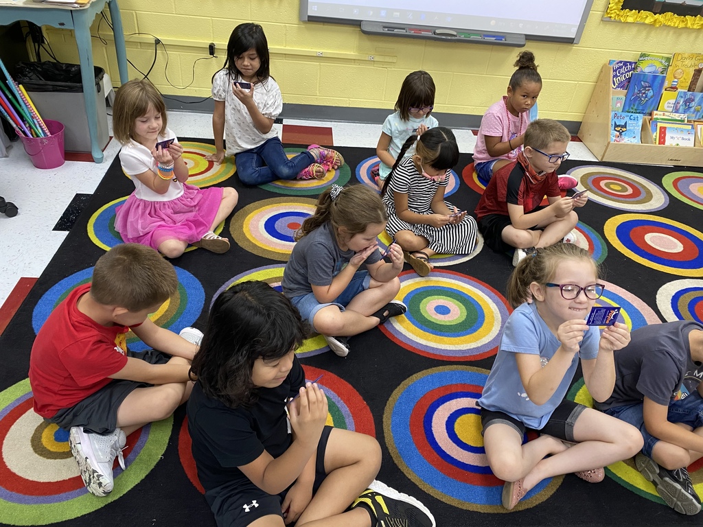 Kindergartners in Mrs. Bradfield's class use mirrors to check their mouth placement when learning letter sounds. Here, they are checking placement for the letter "F"! #CPSZEBRAPRIDE