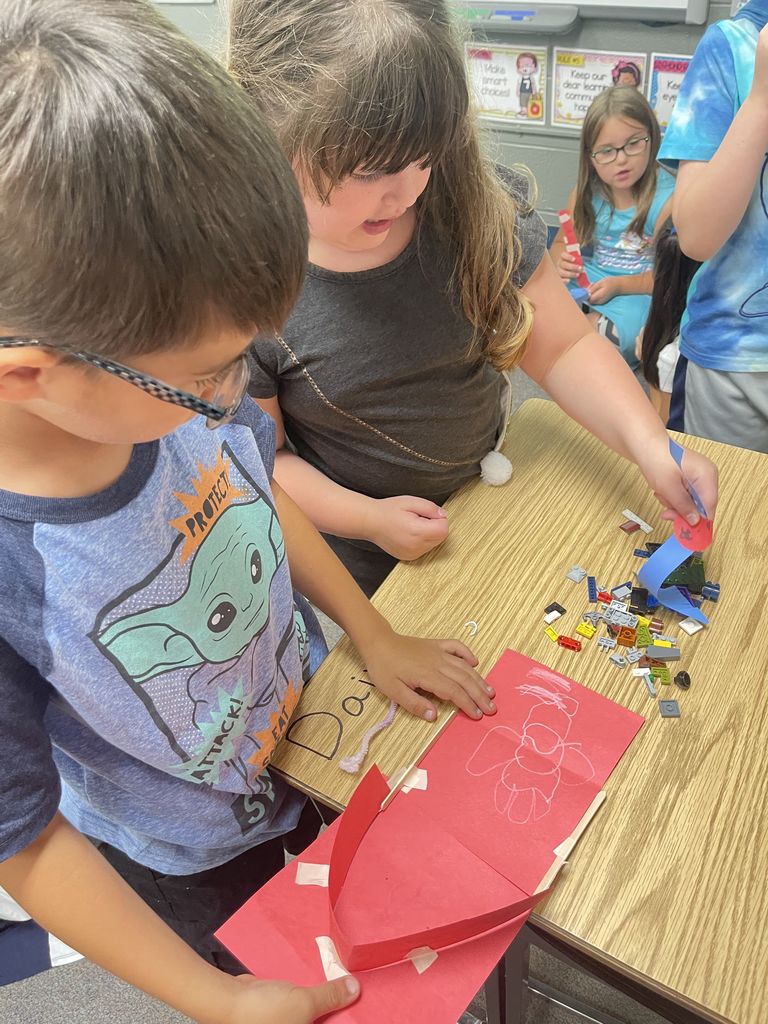 In an introduction to Growth Mindset - the belief that with work, your skills can improve over time - 2nd graders in Mrs. Johnston's class read The Girl Who Never Made Mistakes and then worked together in pairs on a STEM activity. For this STEM activity, students were challenged to design and build a broom and dustpan - using only construction paper and tape - to clean up the mistakes we all inevitably make. #CPSZEBRAPRIDE