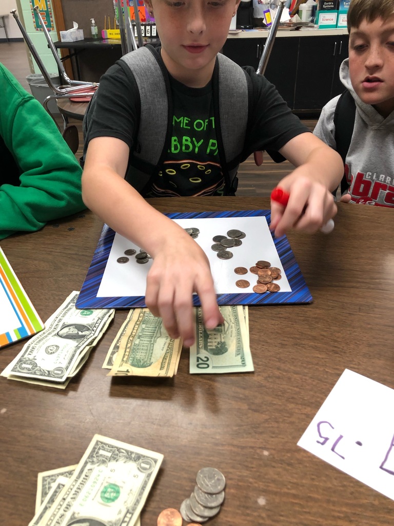 5th grade students can "Show YOU the Money!" Students in Ms. Anderson and Ms. Bailey's classes spent time in small groups working with real money learning how to make change. This experience afforded students real-life, hands-on exposure to how what they are learning now can be used in their near futures, and some of them got to use what they learned at the Book Fair! #CPSZEBRAPRIDE
