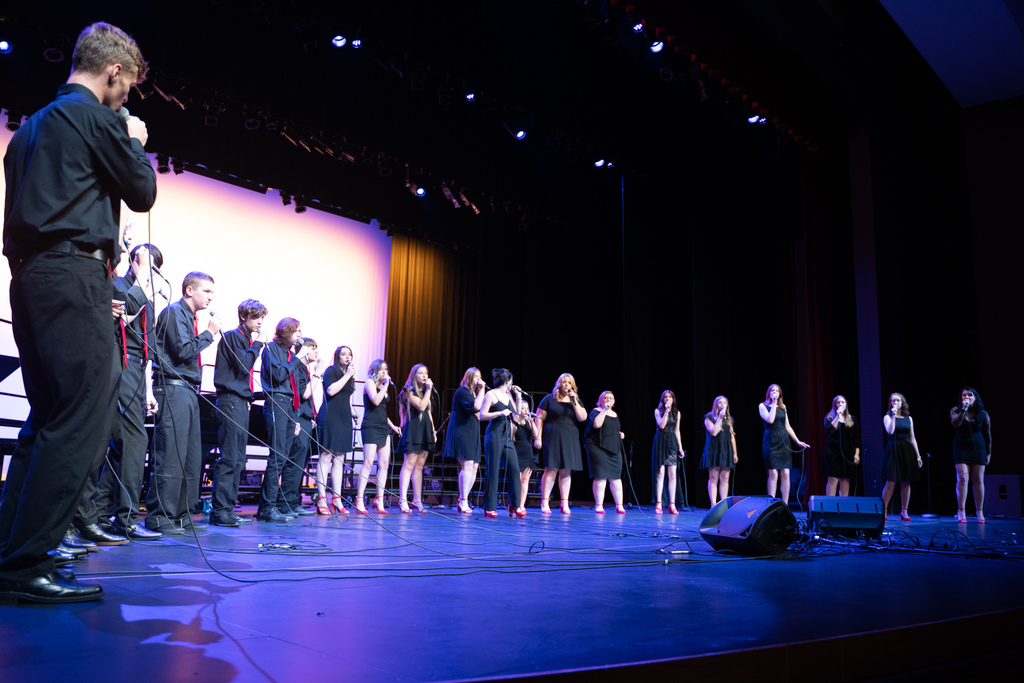choir in a semicircle singing