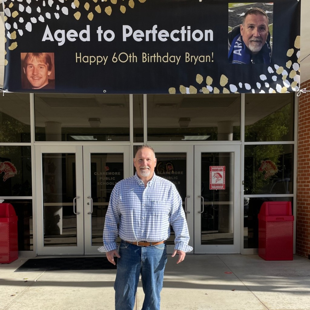 Mr Frazier with this happy birthday banner