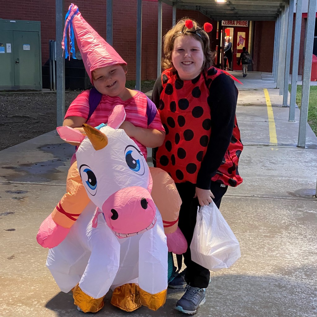 2 student dressed as a horse and ladybug