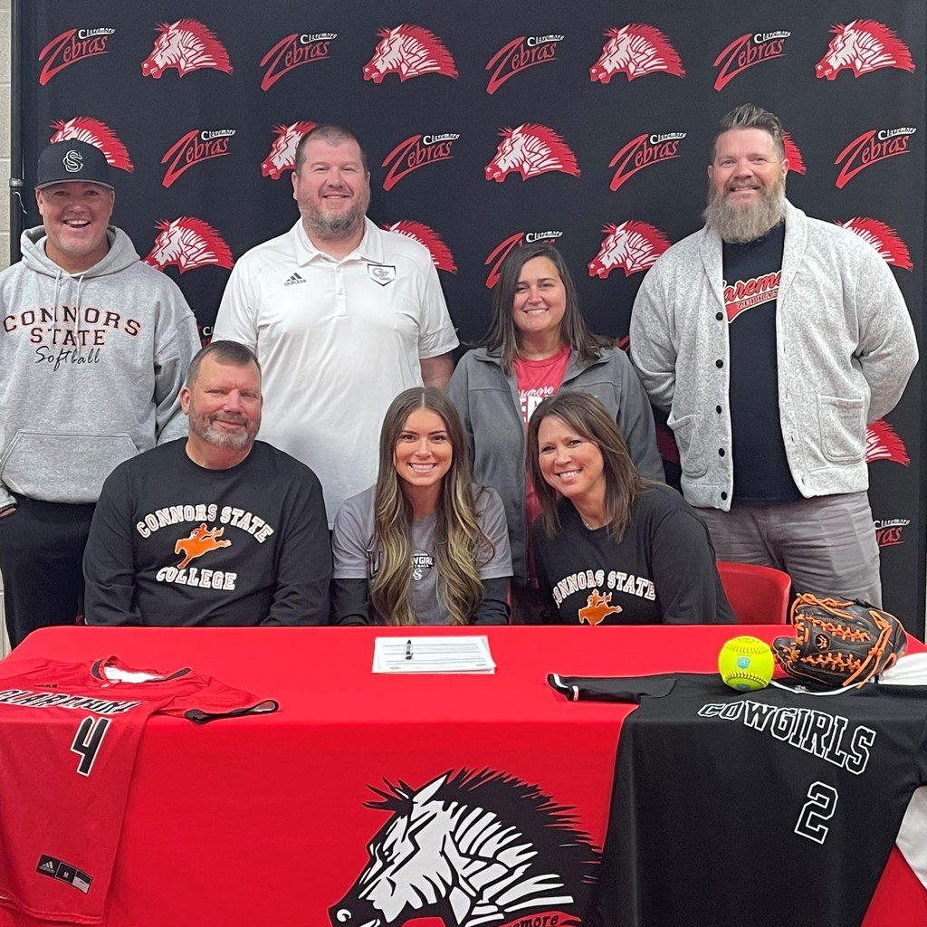 Jayen with her parents, CHS coaches, and Conners coach