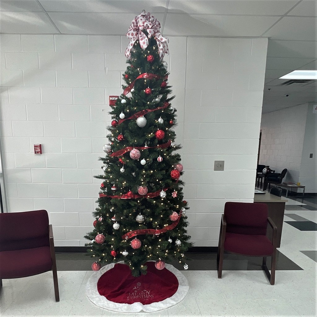larger Christmas tree w/ red & white ornaments