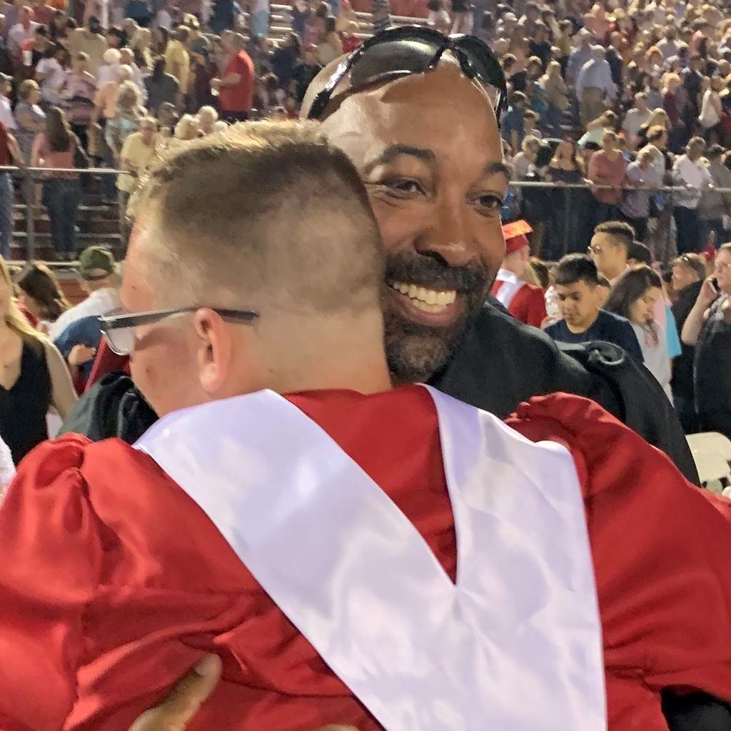 graduation hug