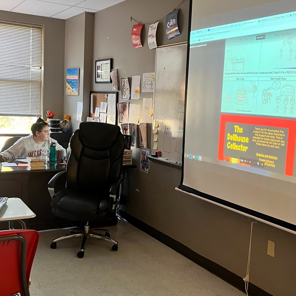 teacher teaching from a computer