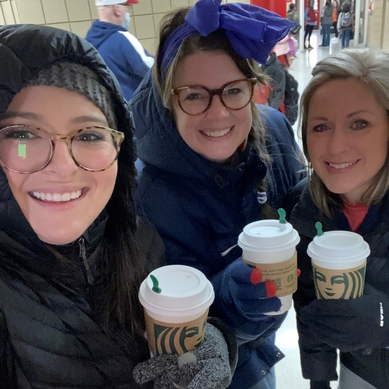 3 teachers with cups of  hot chocolate 