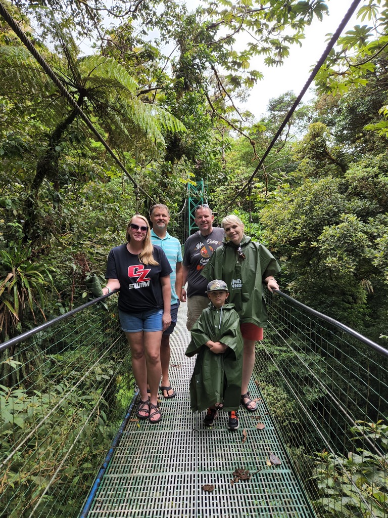 on bridge in rainforest
