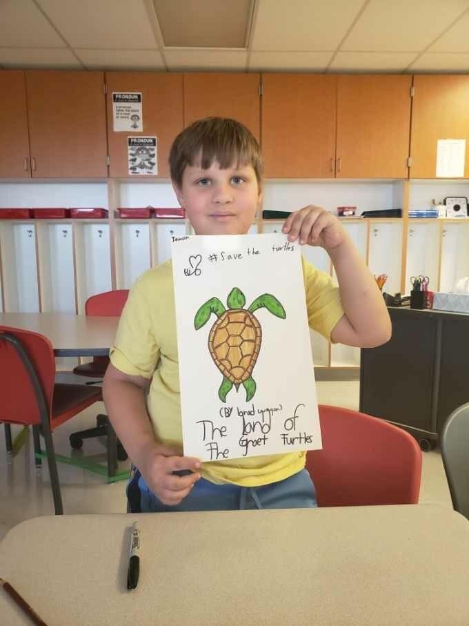 Student draws Native American symbols