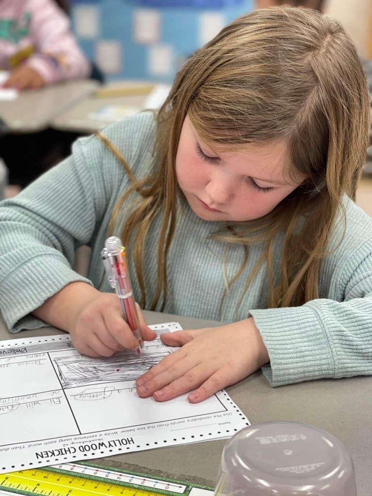 student working on vocab