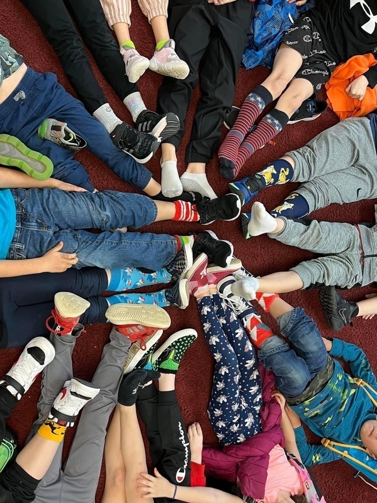 kids with feet in circle with crazy socks