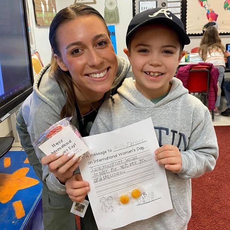student getting teacher a letter