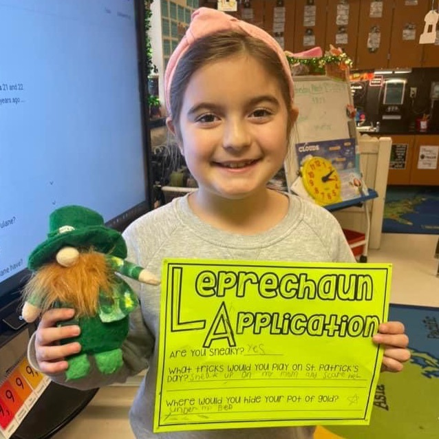 student with Lenny, the leprechaun in their application