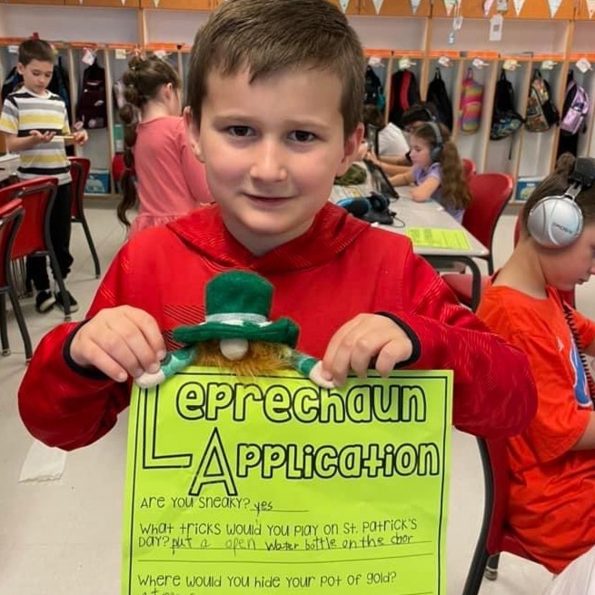 student with Lenny, the leprechaun in their application