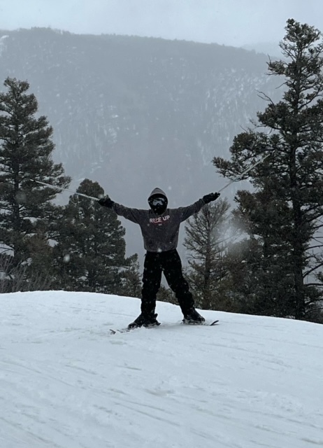 kid skiing on mountain 