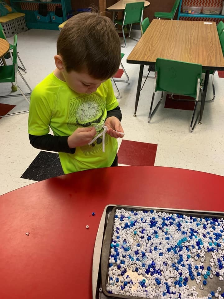 Claremont students play with manipulatives