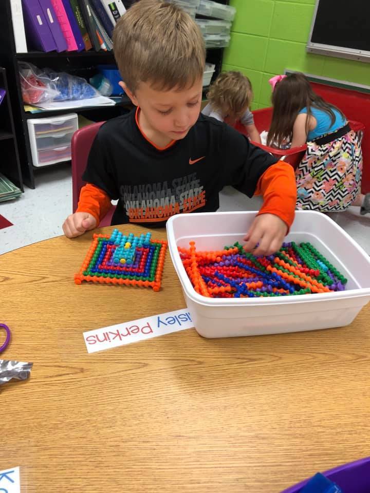 Claremont students play with manipulatives