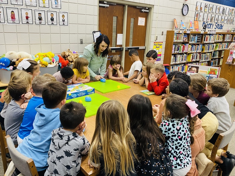 troyer working with students