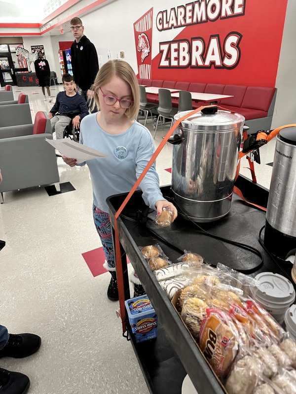 student making drinks