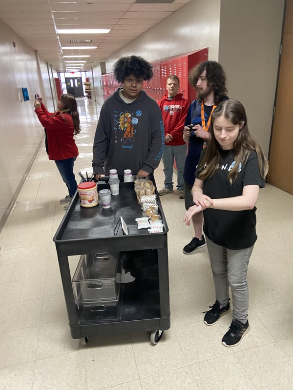 students with cart